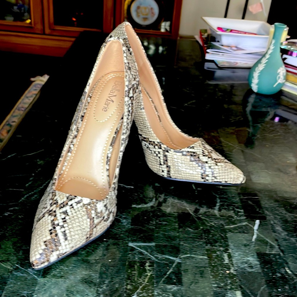 Barely worn stiletto heels. Animal print, size 8.